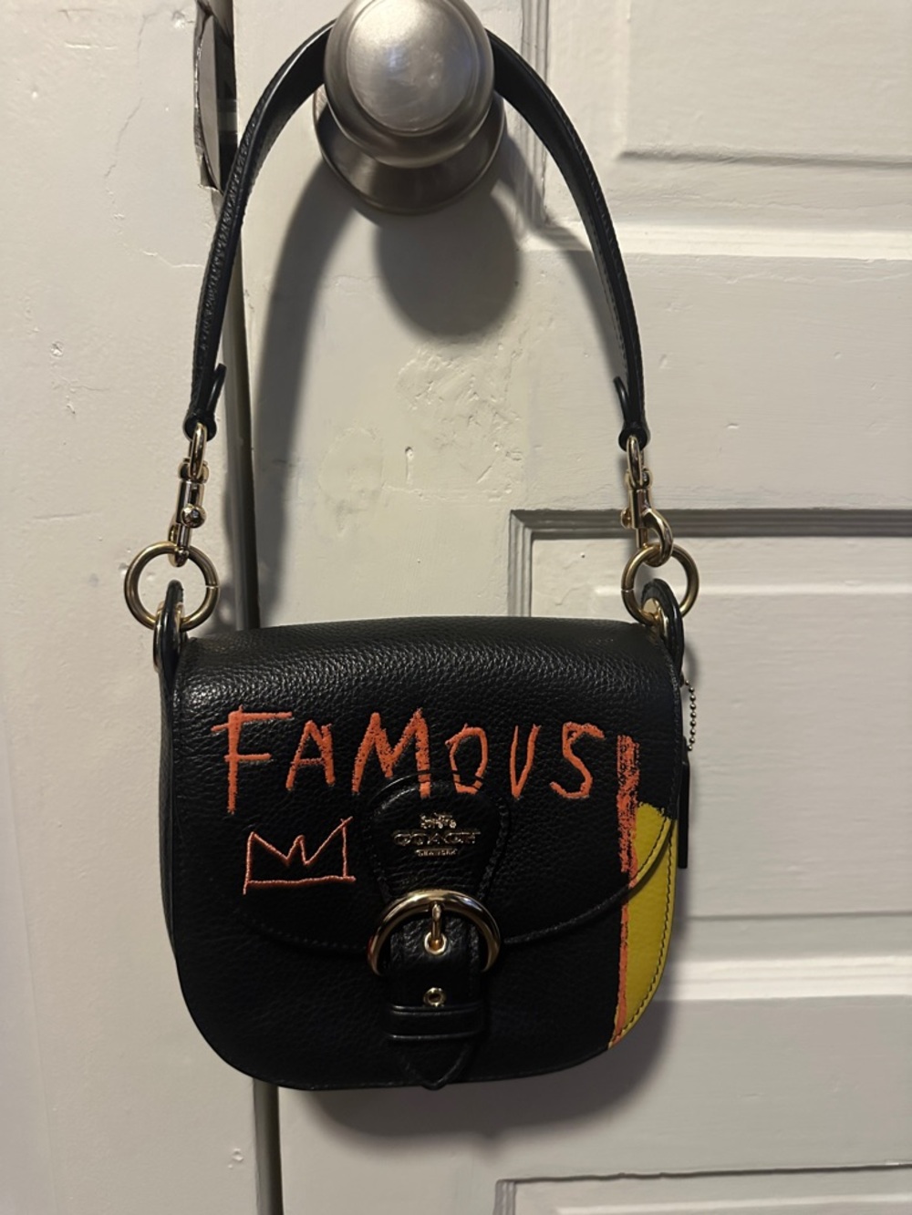 Coach Black Leather Crossbody with Orange 'FAMOUS' Paint and Yellow Accent
